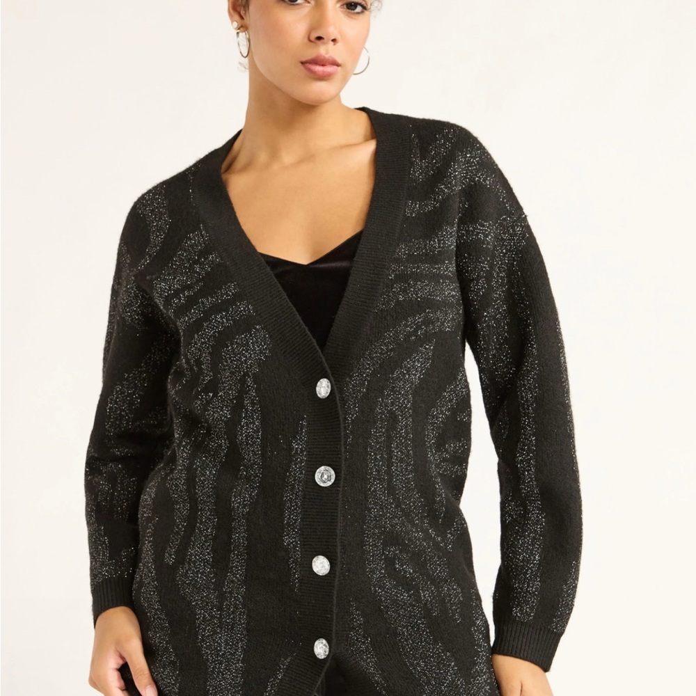 New Sofia Vergara shimmer black cardigan in a Size Medium.